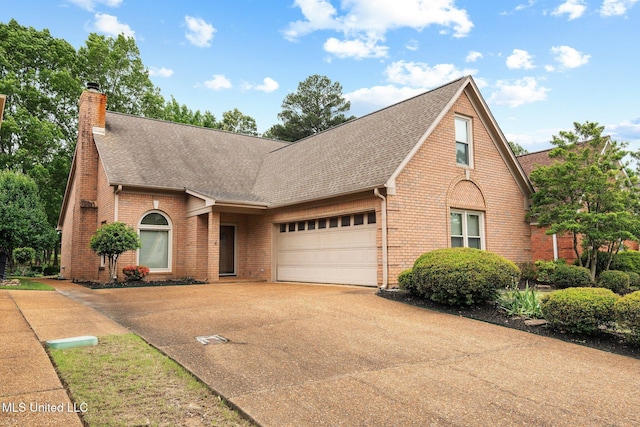 view of front of house with brick siding, roof with shingles, concrete driveway, and a garage
