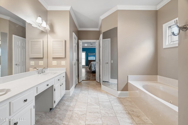 full bathroom with crown molding, a bath, double vanity, baseboards, and ensuite bathroom