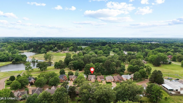 aerial view of residential area with a nearby body of water and a local golf course