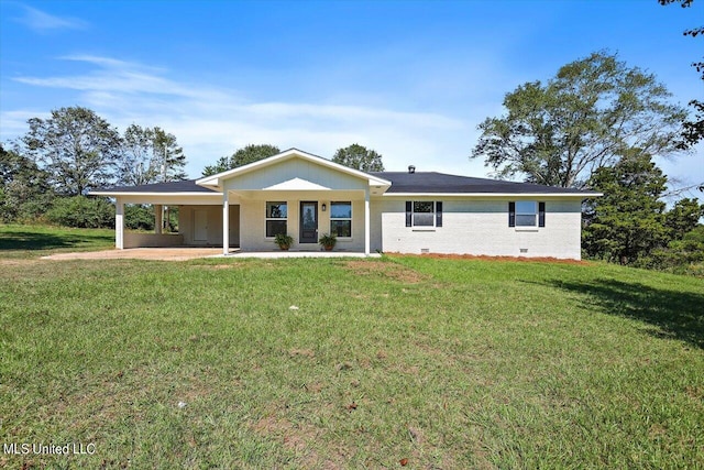 ranch-style house featuring a carport, a porch, and a front lawn