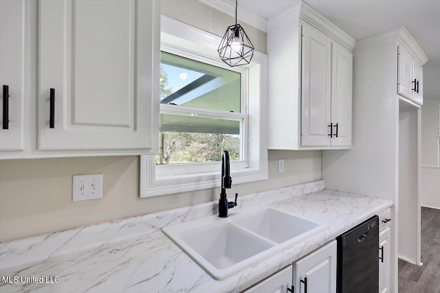 kitchen featuring hardwood / wood-style floors, dishwasher, white cabinets, sink, and light stone counters