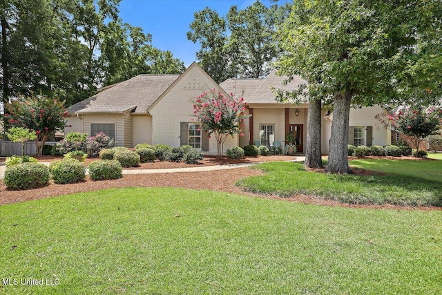 215 Grayhawk Dr, Madison, MS 39110 - view of front of house with a front yard and stucco siding