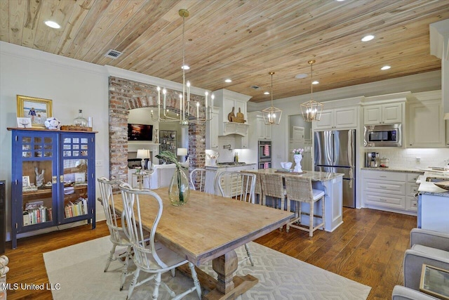 215 Grayhawk Dr, Madison, MS 39110 - dining space with wooden ceiling, dark wood-style floors, recessed lighting, crown molding, and a fireplace
