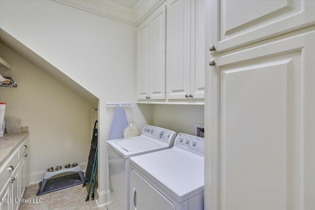 215 Grayhawk Dr, Madison, MS 39110 - washroom with cabinet space, washing machine and dryer, and light tile patterned flooring