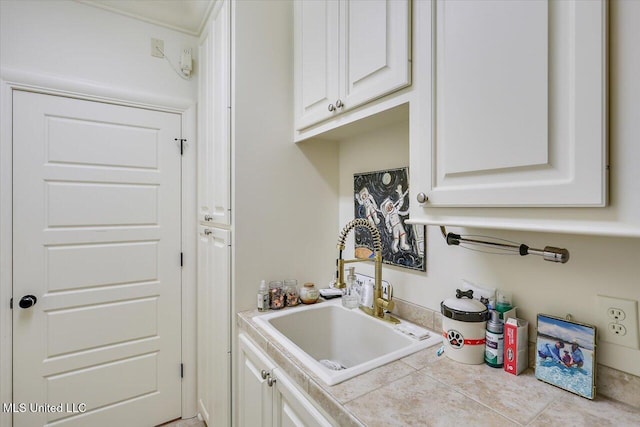 215 Grayhawk Dr, Madison, MS 39110 - kitchen featuring a sink and white cabinets