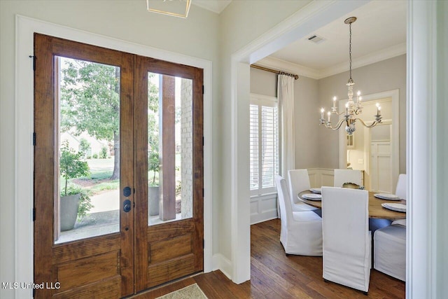 215 Grayhawk Dr, Madison, MS 39110 - entrance foyer featuring crown molding, dark wood-style flooring, a chandelier, and french doors