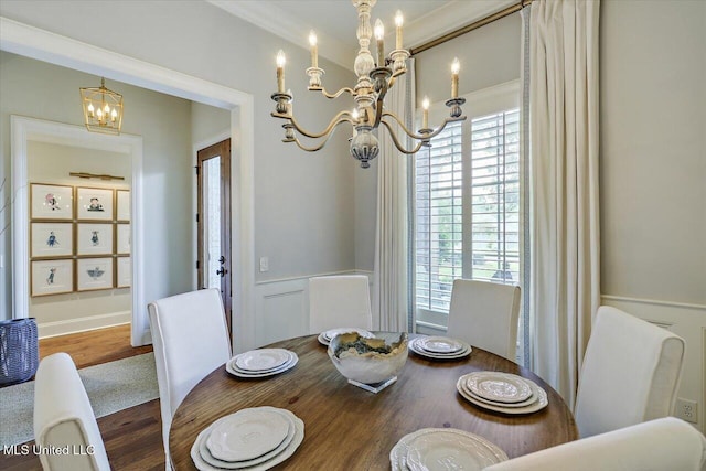 215 Grayhawk Dr, Madison, MS 39110 - dining room featuring a chandelier, wood finished floors, and crown molding