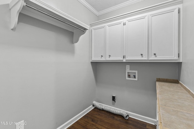 clothes washing area featuring washer hookup, hardwood / wood-style flooring, hookup for an electric dryer, crown molding, and cabinets