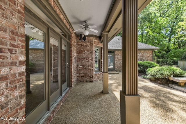 view of patio featuring ceiling fan