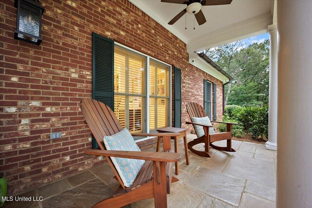 view of patio / terrace featuring a ceiling fan