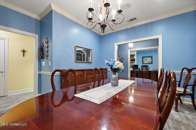 dining room featuring baseboards, visible vents, a notable chandelier, and crown molding