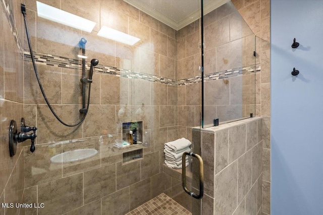 full bath featuring ornamental molding and a stall shower