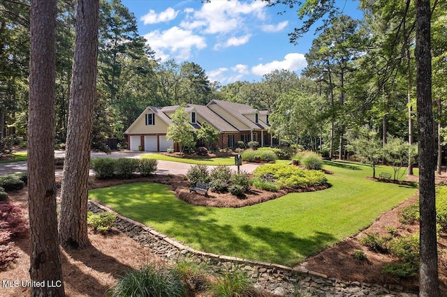 view of yard featuring a garage