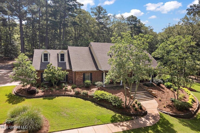 view of front of home with a front yard