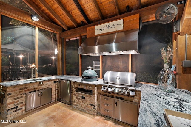 view of patio / terrace featuring exterior kitchen, grilling area, and a sink