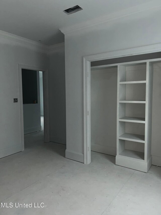 13146 Carrolton St, Biloxi, MS 39532 - unfurnished bedroom featuring ornamental molding