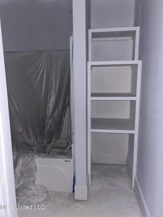 13146 Carrolton St, Biloxi, MS 39532 - bathroom featuring concrete flooring