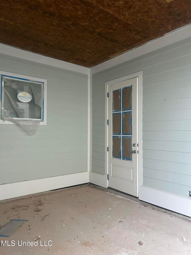 13146 Carrolton St, Biloxi, MS 39532 - view of exterior entry featuring a patio area