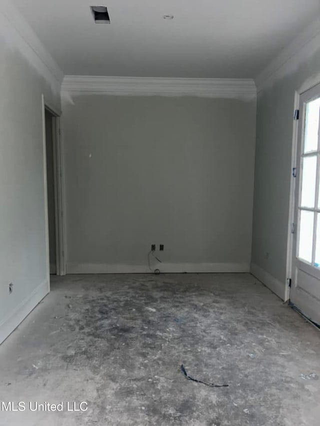 13146 Carrolton St, Biloxi, MS 39532 - spare room with plenty of natural light and crown molding