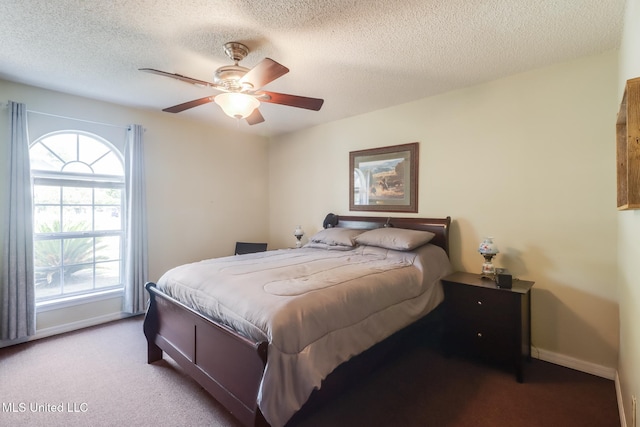176 Briarfield Ave, Biloxi, MS 39531 - carpeted bedroom featuring ceiling fan, a textured ceiling, and baseboards