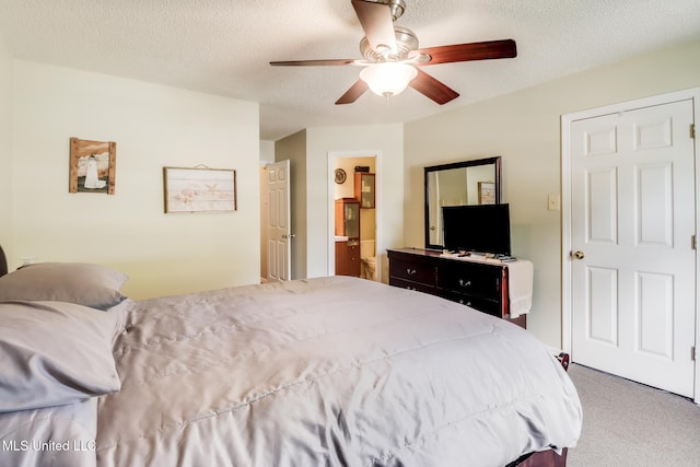176 Briarfield Ave, Biloxi, MS 39531 - bedroom featuring carpet, a textured ceiling, and a ceiling fan