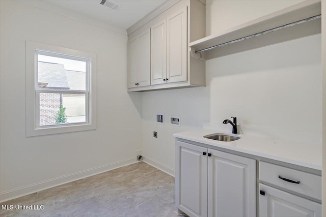121 Ashby Ridge Dr, Canton, MS 39046 - washroom featuring washer hookup, cabinet space, electric dryer hookup, and baseboards