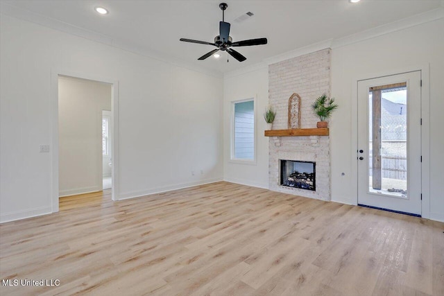 121 Ashby Ridge Dr, Canton, MS 39046 - unfurnished living room with wood finished floors, crown molding, ceiling fan, baseboards, and recessed lighting