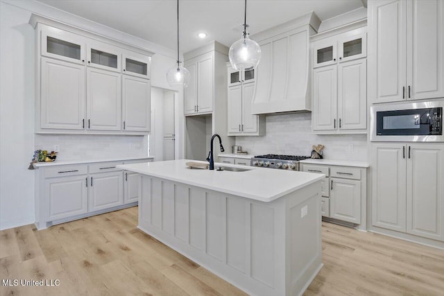 121 Ashby Ridge Dr, Canton, MS 39046 - kitchen with built in microwave, a sink, decorative backsplash, light countertops, and recessed lighting