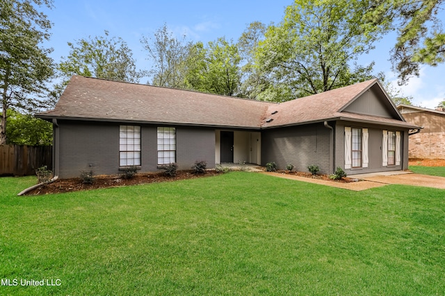 single story home with a front yard