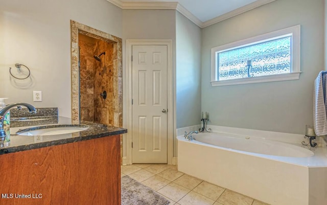 bathroom featuring independent shower and bath, vanity, ornamental molding, and tile patterned floors