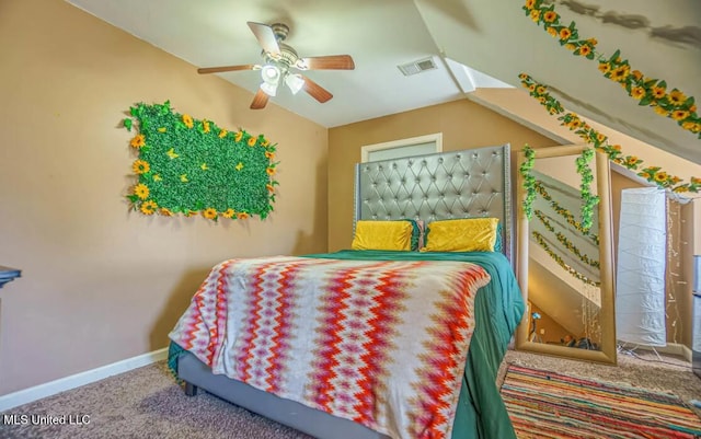 carpeted bedroom featuring lofted ceiling and ceiling fan