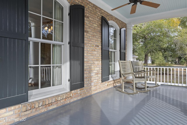 exterior space featuring ceiling fan