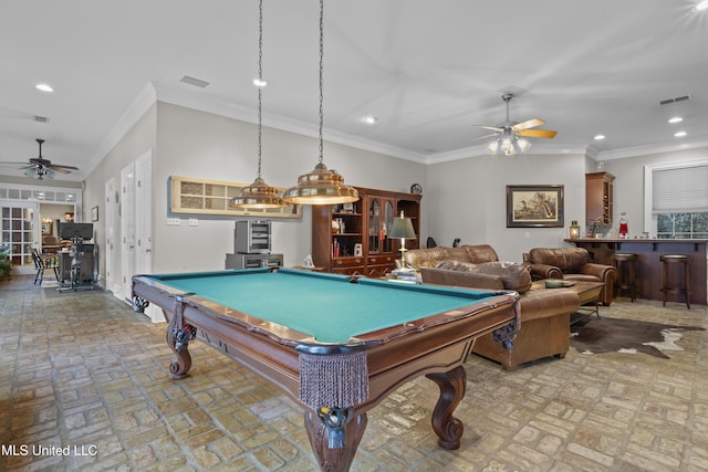 recreation room with ornamental molding, pool table, bar area, and ceiling fan