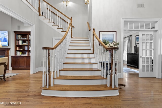 stairway featuring hardwood / wood-style flooring