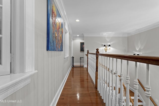 hall featuring crown molding and hardwood / wood-style floors