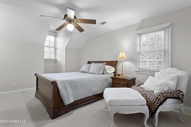 carpeted bedroom with lofted ceiling and ceiling fan