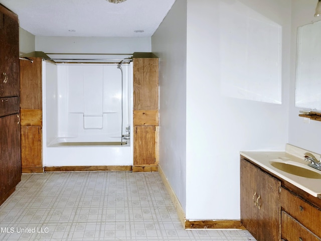 bathroom with vanity and tub / shower combination