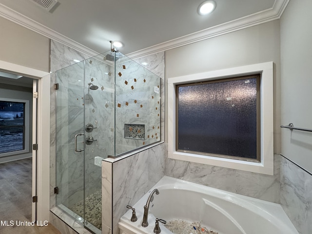 bathroom with visible vents, ornamental molding, a marble finish shower, and a bath