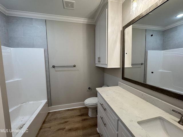 full bath with ornamental molding, visible vents, vanity, and wood finished floors