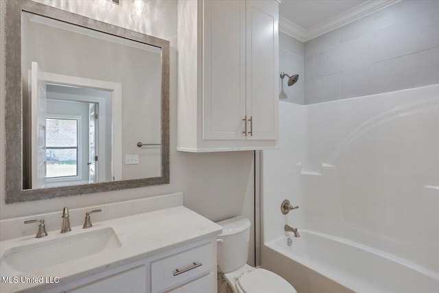 full bath featuring toilet, ornamental molding, shower / washtub combination, and vanity