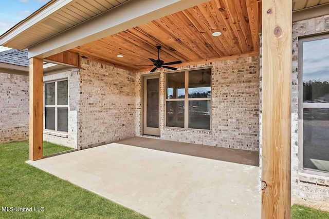 view of patio featuring ceiling fan