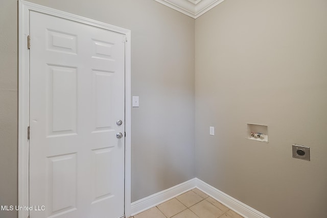 laundry area featuring hookup for an electric dryer, hookup for a washing machine, and light tile patterned floors