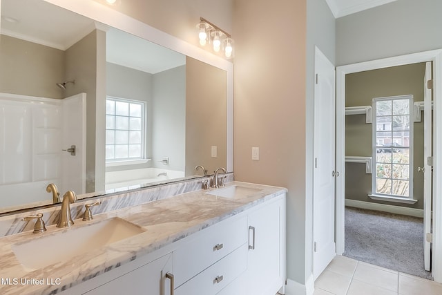 bathroom with crown molding, vanity, independent shower and bath, and tile patterned flooring