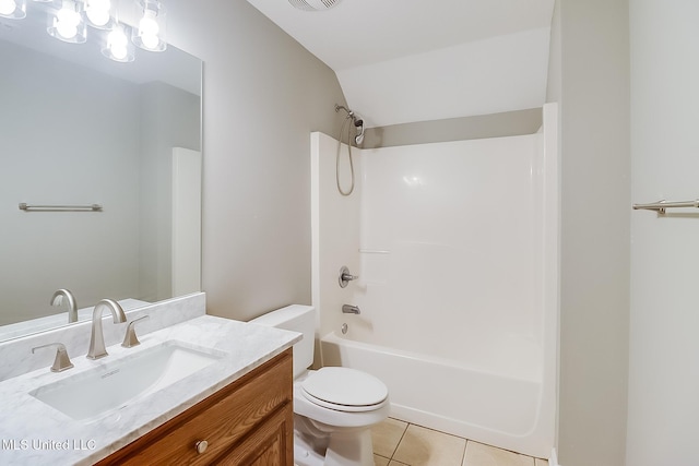 full bathroom featuring tile patterned floors, toilet, bathing tub / shower combination, vaulted ceiling, and vanity