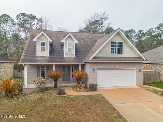 view of front facade featuring a garage and a front yard