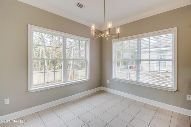 unfurnished dining area with crown molding, light tile patterned flooring, and an inviting chandelier