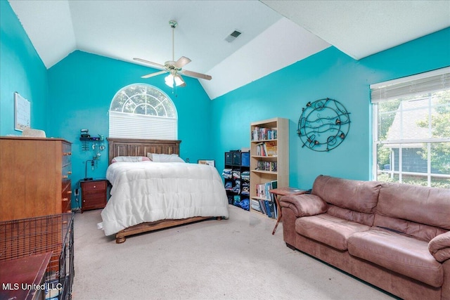 1826 Towson Ln, Horn Lake, MS 38637 - carpeted bedroom with vaulted ceiling, multiple windows, and a ceiling fan