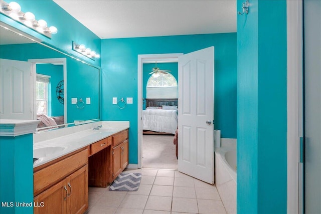 1826 Towson Ln, Horn Lake, MS 38637 - ensuite bathroom with a bath, double vanity, and tile patterned flooring
