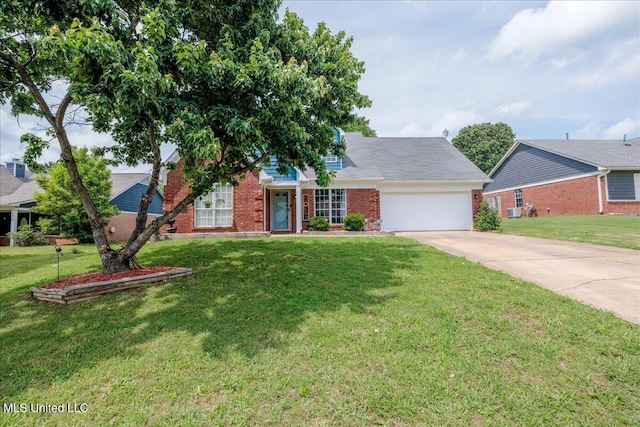 1826 Towson Ln, Horn Lake, MS 38637 - view of front of house with brick siding, an attached garage, driveway, and a front lawn