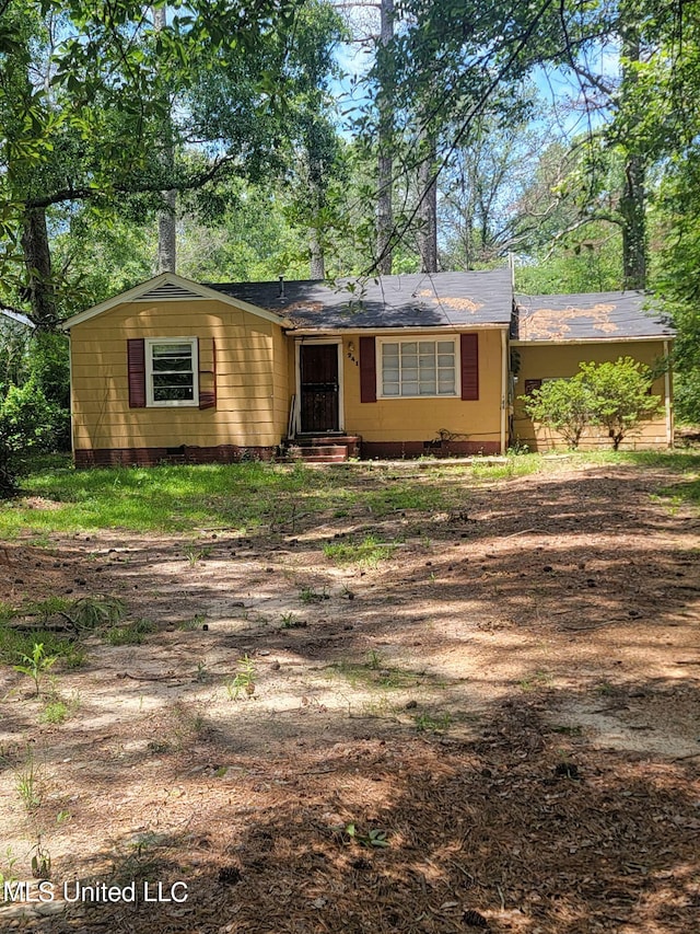 ranch-style home with an attached carport and crawl space